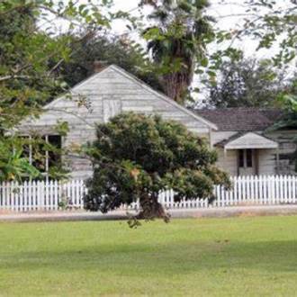 a large lawn in front of a house