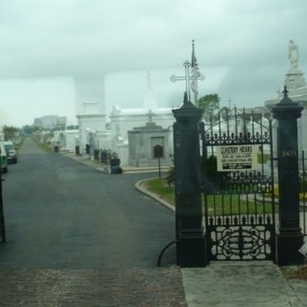 a large building with a metal fence