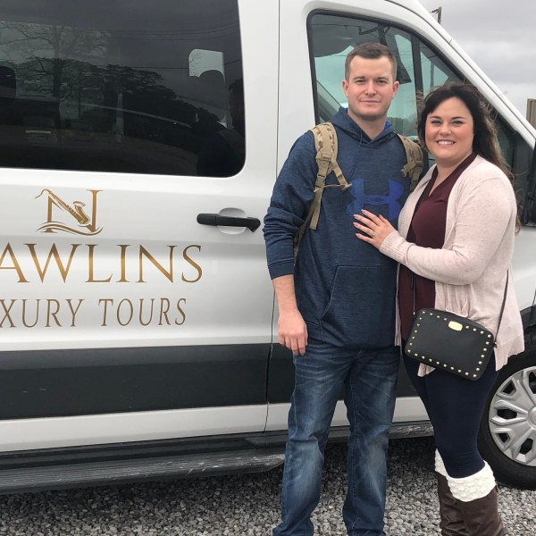 Sarah Greene standing in front of a car posing for the camera