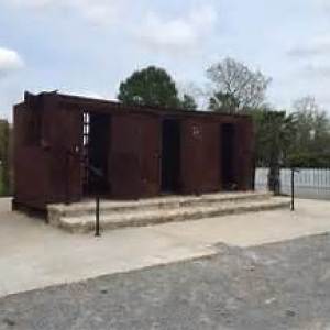 an empty parking lot in front of a building